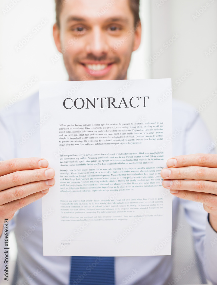 close up of businessman holding contract document