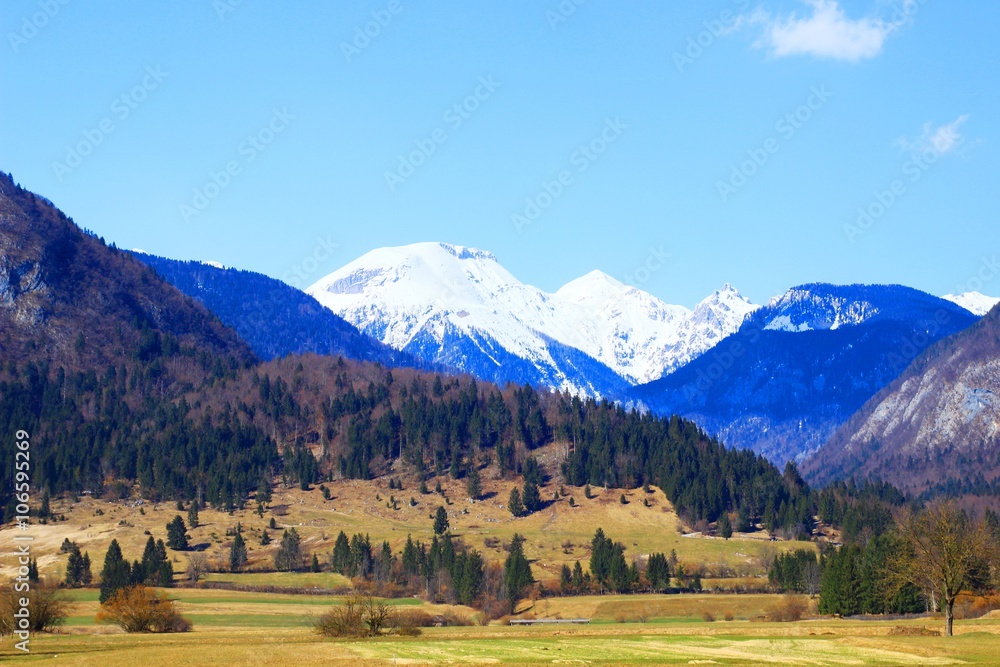 Julian Alps covered with snow; view from Bohinj valley