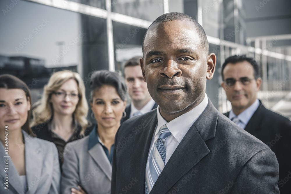 Business people smiling outdoors Business people smiling outdoors