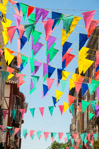 Colorful garlands decorating the streets of the city of Bayonne during the summer festival (fetes de Bayonne) in august