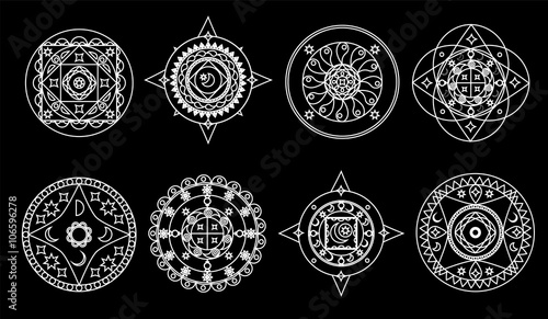 White mandalas on black background