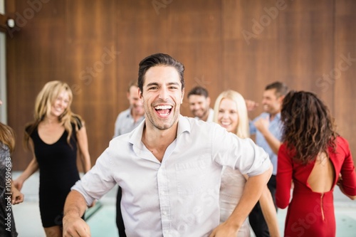 Group of young friends dancing