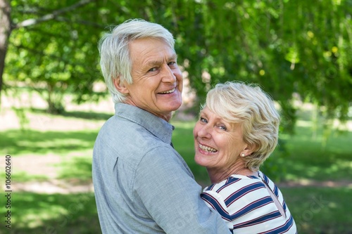 Rear view of senior couple embracing