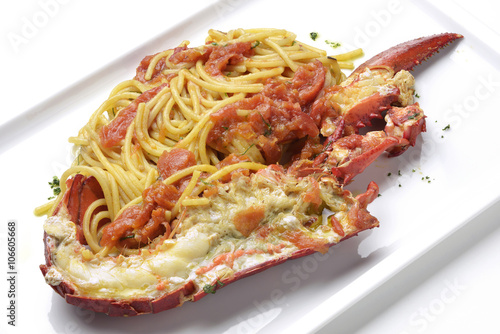 Spaghetti with lobster and semi dry tomatoes photo