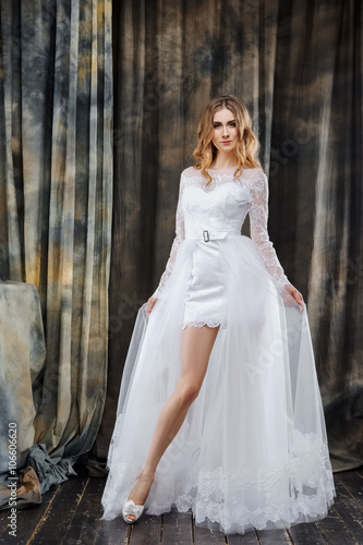 portrait of pretty bride in wedding dress