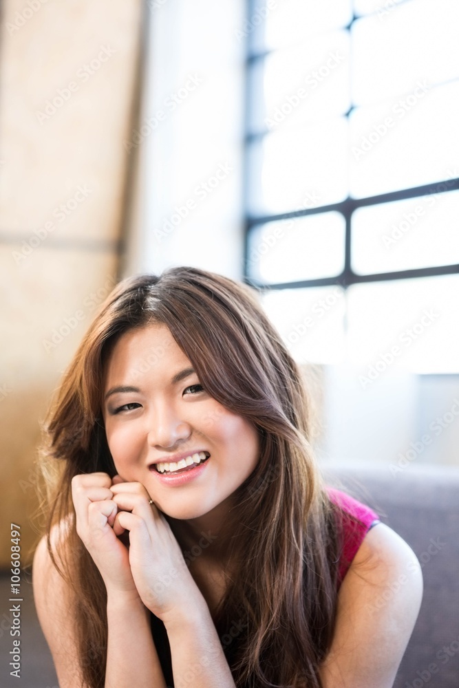 Businesswoman looking at camera and smiling Businesswoman looking at camera and smiling