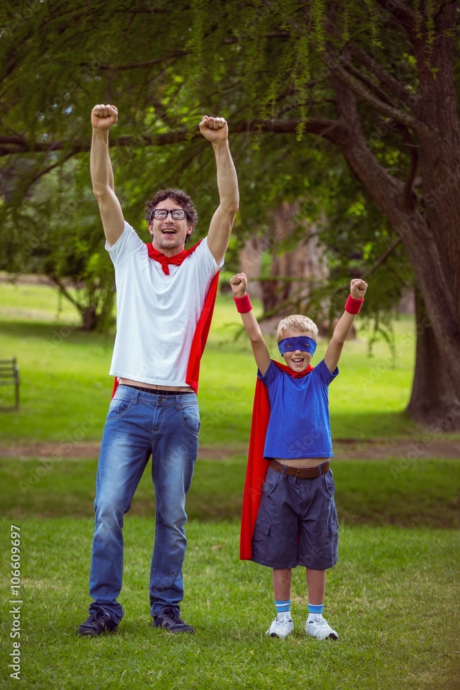 Obraz premium Father and son pretending to be superhero