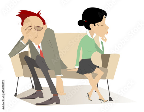 Disappointment. Man and woman in low spirits sit on the contrary edges of the sofa 
