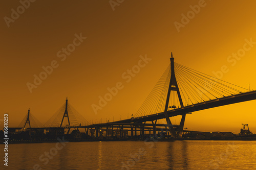 Silhouette Bhumibol Bridge or Industrial Ring Road bridge at twi © mathisa
