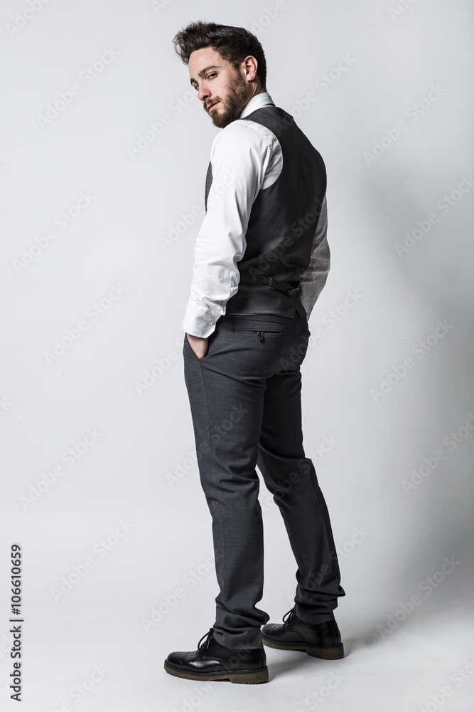 Handsome young businessman looking at camera. Isolated on white. Handsome young businessman looking at camera. Isolated on white.