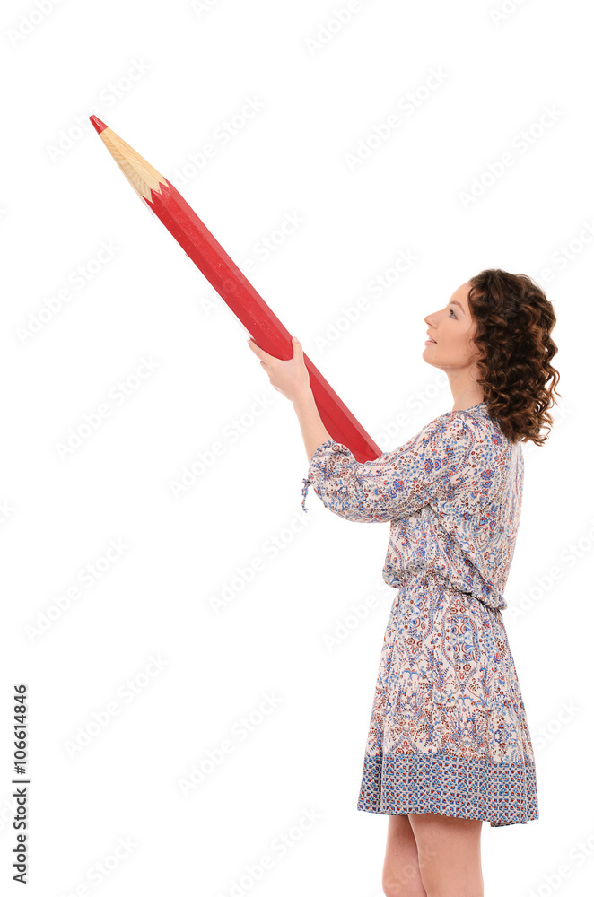 young pretty woman with giant red pencil young pretty woman with giant red pencil