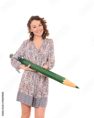 young smiling woman with huge green pencil