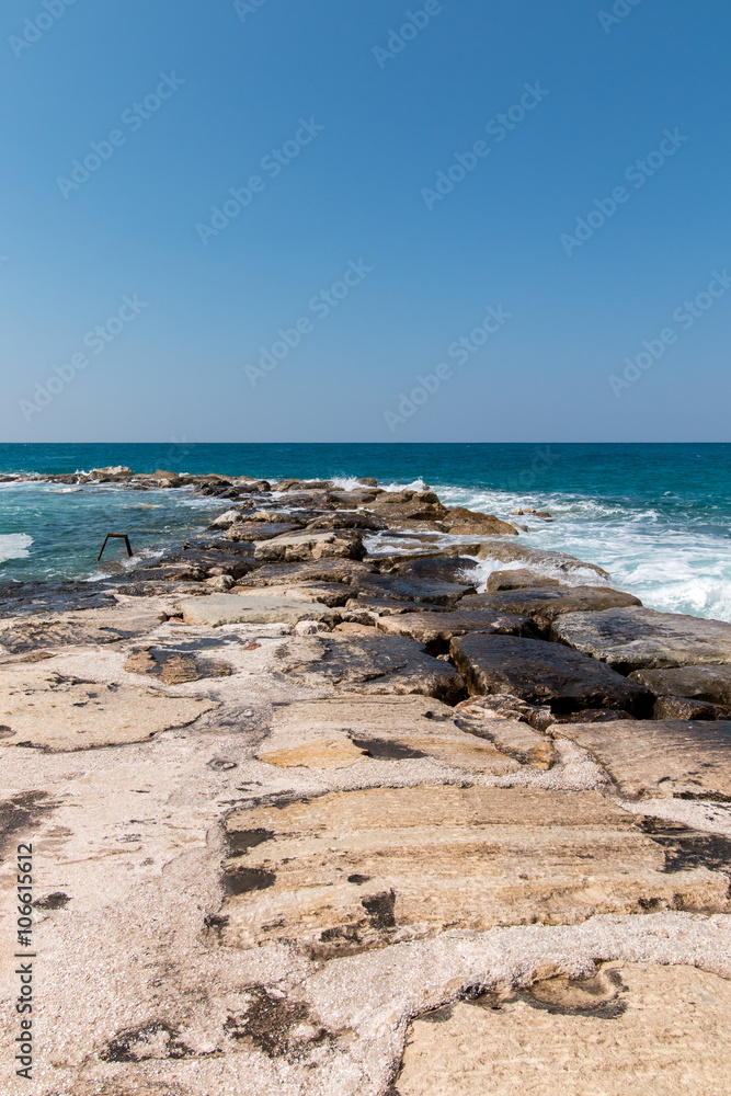 Ocean coastline with small waves Ocean coastline with small waves