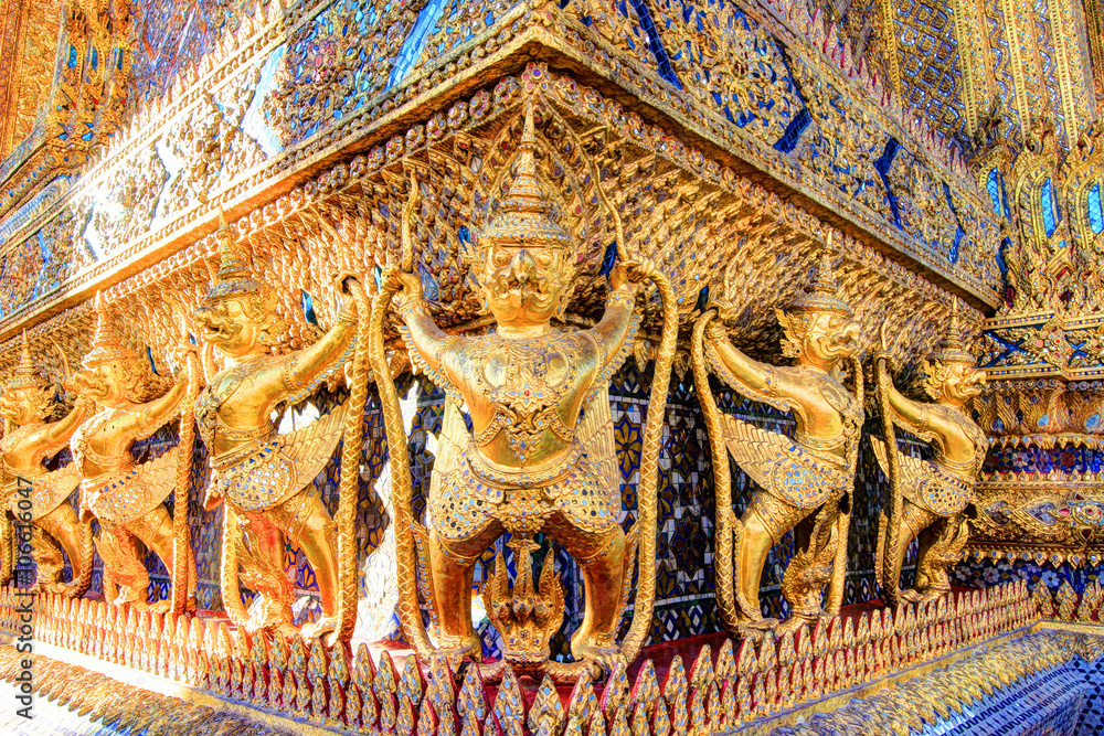 Golden statue inside public royal temple