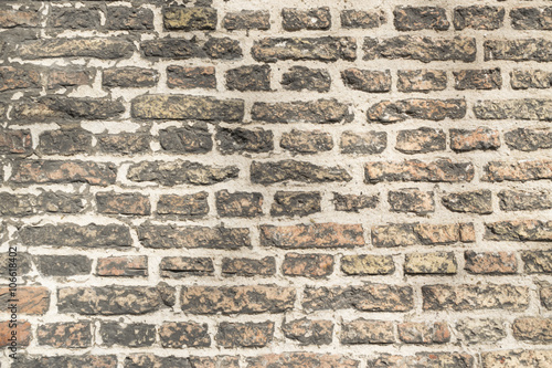 Brick background formed by a part of a church wall in Delft, Netherland.