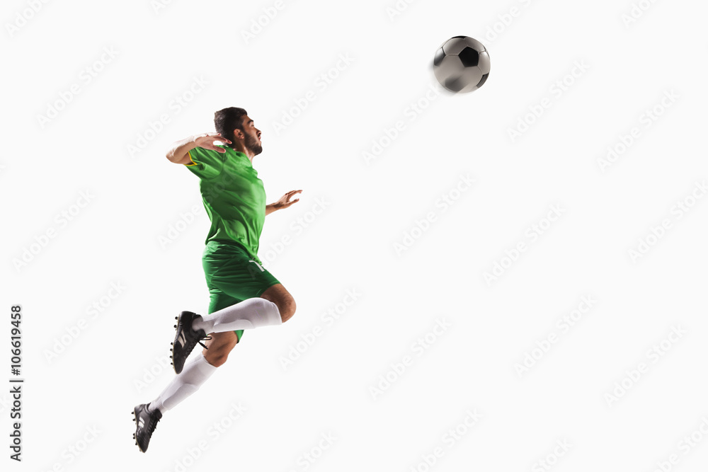 Fototapeta premium Athlete heading soccer ball
