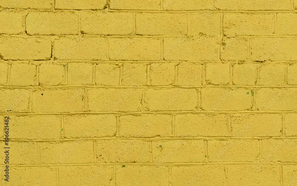 Obraz premium Light yellow brick background. interesting vintage concept texture