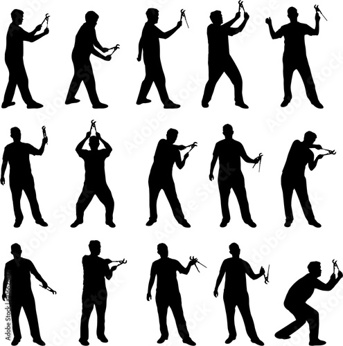 Man with wrench vector silhouettes
