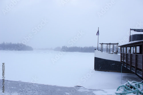 A boat in the winter landscape photo