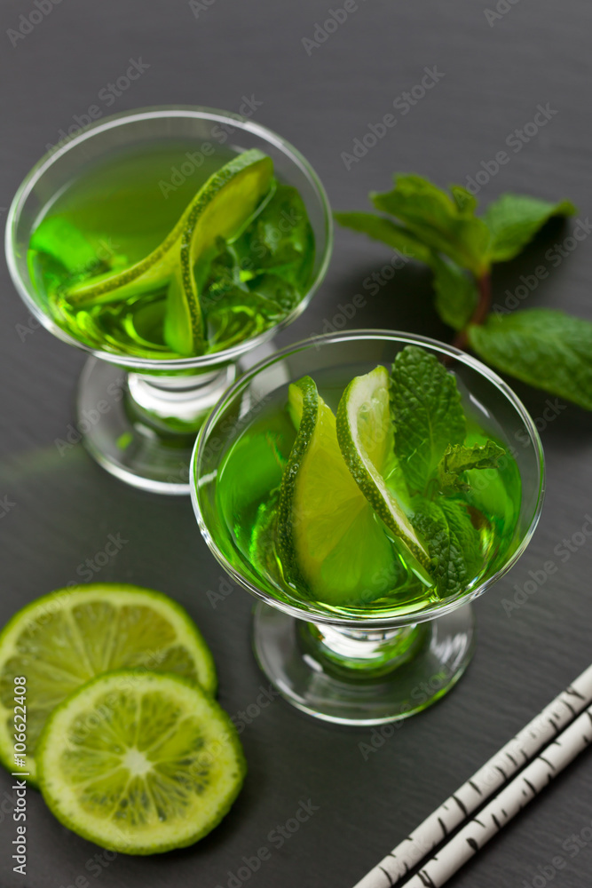 Lime and Mint, Green Vodka Drink. Selective focus. Lime and Mint, Green Vodka Drink. Selective focus.