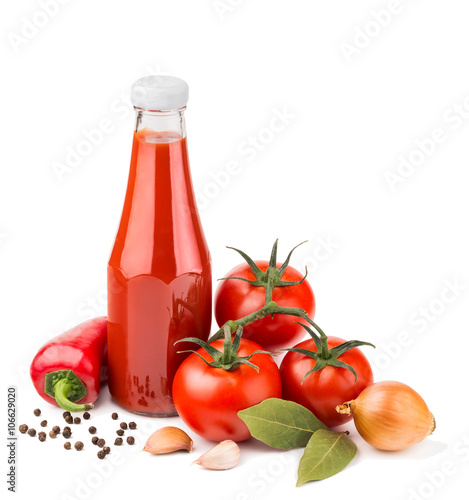 Bottle of ketchup and raw ingredients isolated on white