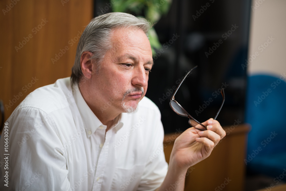 Portrait of a pensive businessman Portrait of a pensive businessman