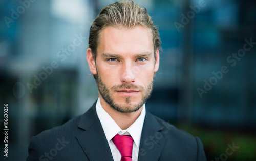 Handsome smiling businessman portrait