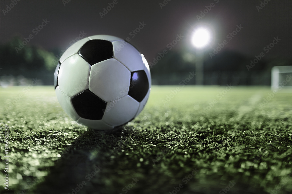 Soccer ball on sports field