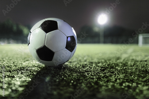Soccer ball on sports field © xixinxing