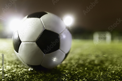 Soccer ball on sports field © xixinxing