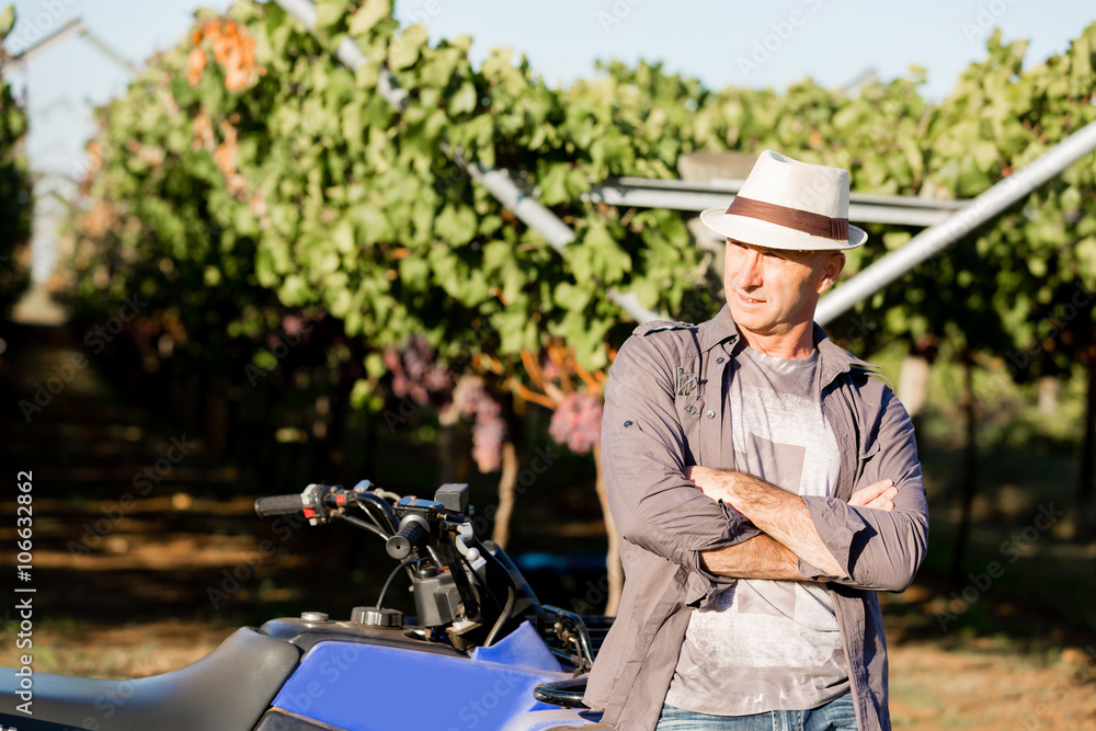 Man standing in vineyard