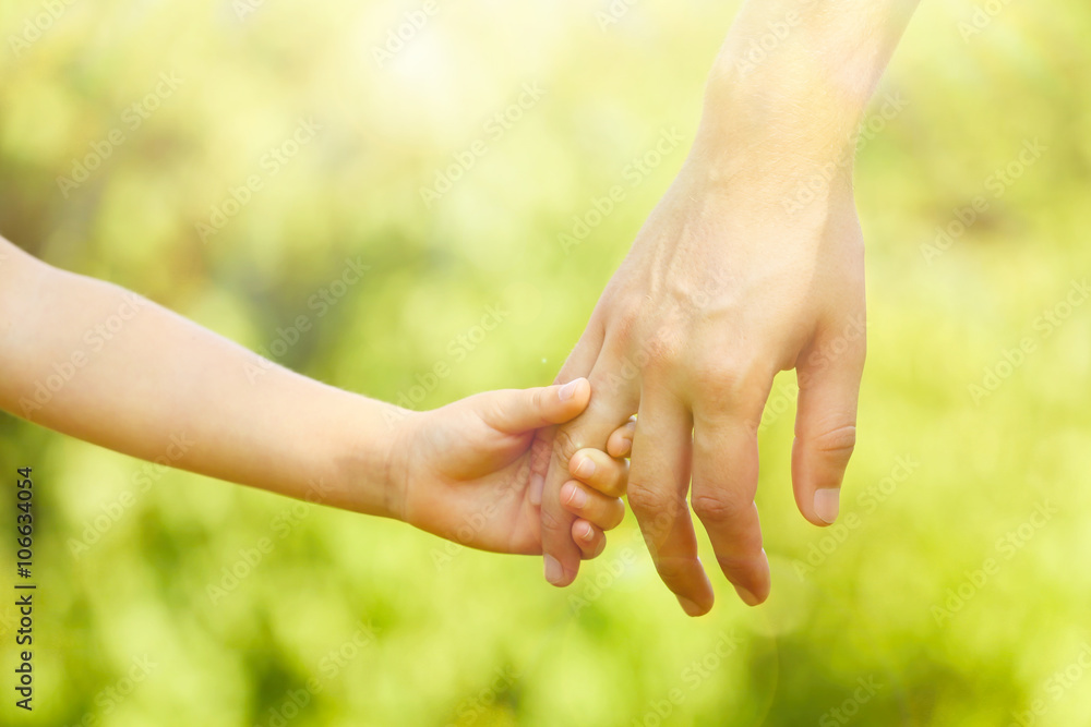 Father and daughter hands outdoors Father and daughter hands outdoors