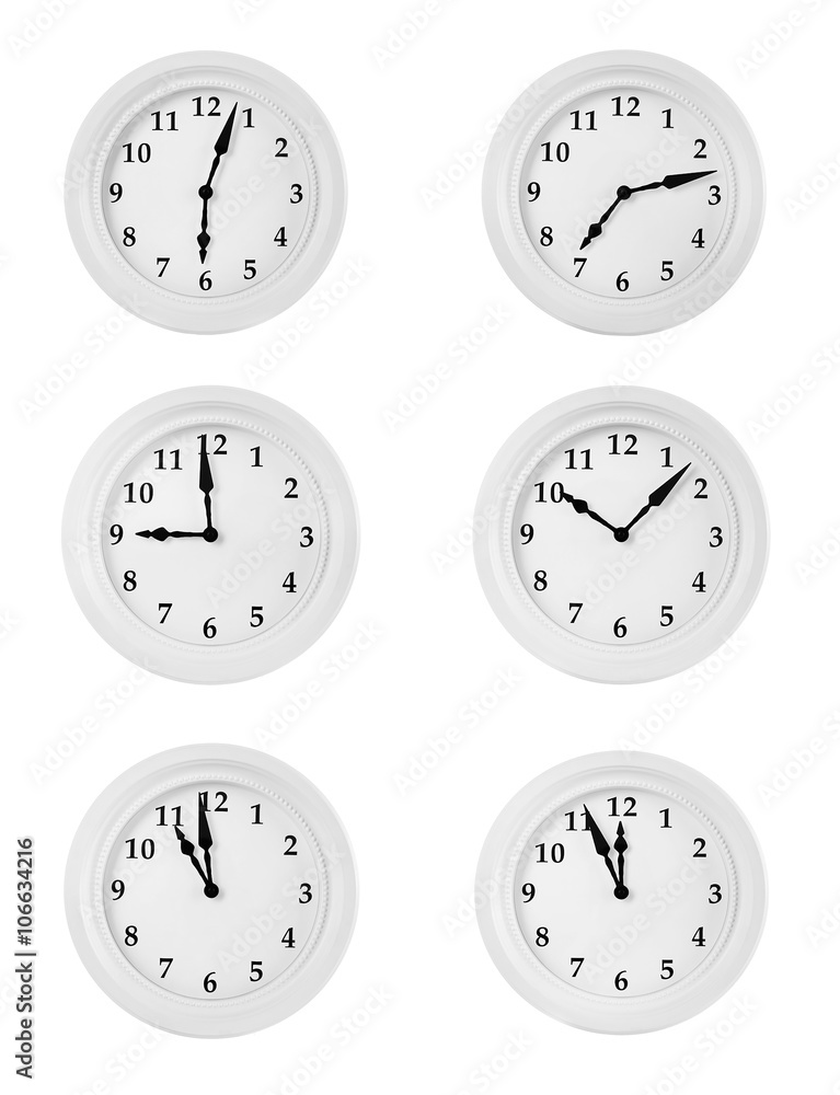 Collage of round wall clocks, isolated on white Collage of round wall clocks, isolated on white