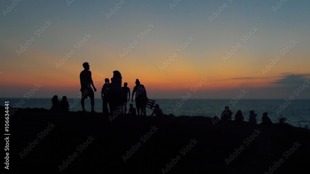 Silhouette of people leaving panoramic view after enjoying the sun falling on the pacific ocean. 4k Silhouette of people leaving panoramic view after enjoying the sun falling on the pacific ocean. 4k