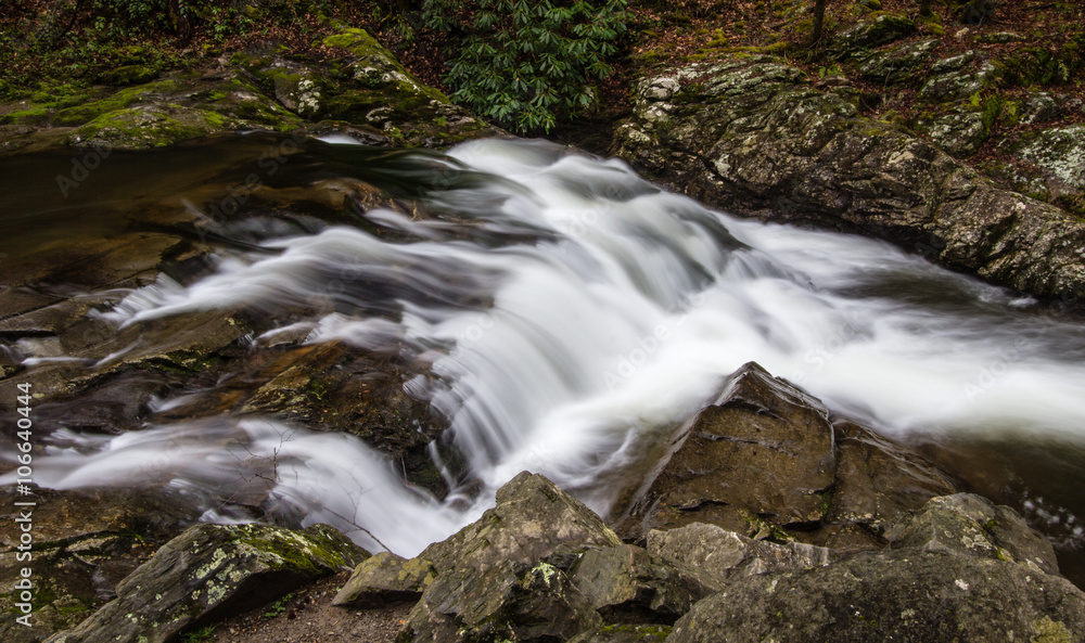 Roadside Waterfall In The Great Smoky Mountains. Easily accessible roadside waterfall in the Great Smoky Mountains National Park. Roadside Waterfall In The Great Smoky Mountains. Easily accessible roadside waterfall in the Great Smoky Mountains National Park.
