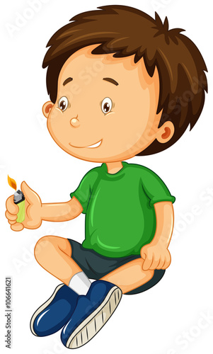 Boy in green shirt playing with light