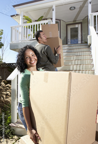 Couple moving into new home photo