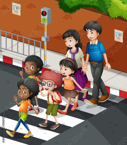 People crossing the road at the zebra  crossing
