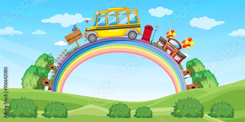 School and school bus on the rainbow