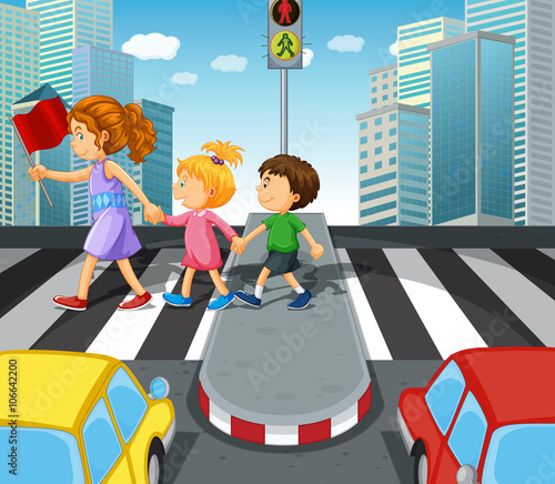 Kids crossing the road at zebra crossing
