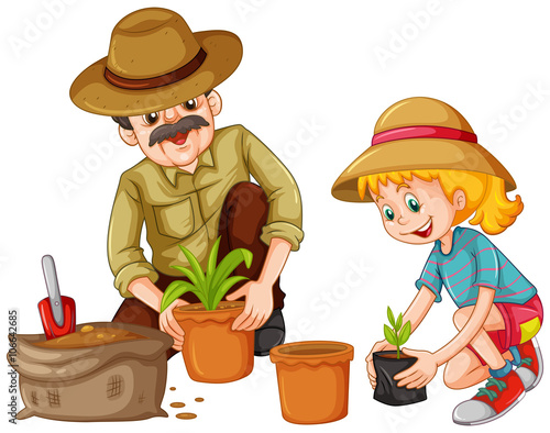 Grandfather and kid planting trees