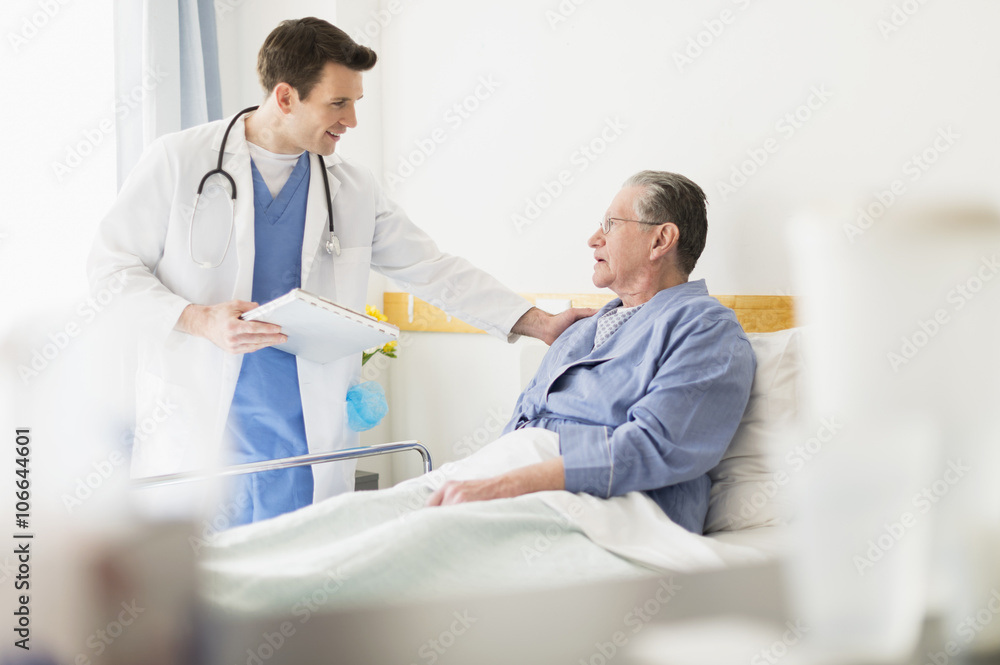Caucasian doctor talking to Senior patient in hospital Caucasian doctor talking to Senior patient in hospital