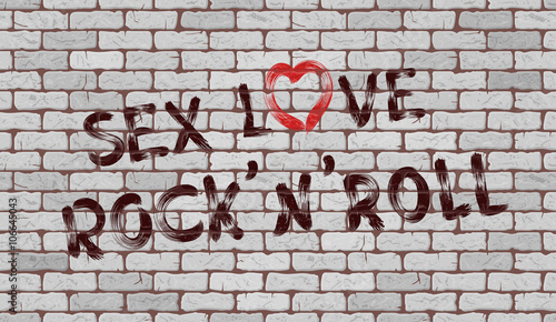 Inscription Sex love rock'n'roll on the wall