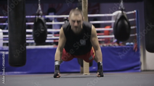 Wallpaper Mural Sports: Man is practicing kick in a boxing gym Torontodigital.ca