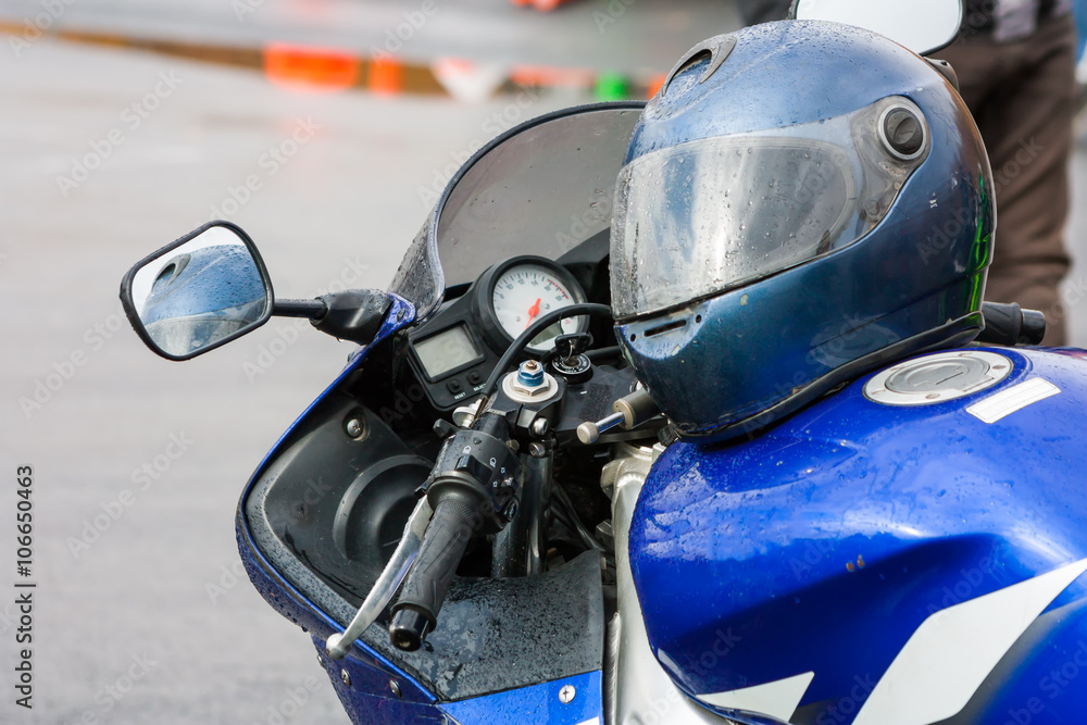 Helmet on a motorcycle in the rain Helmet on a motorcycle in the rain