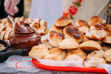Dishes of the traditional Belarusian cuisine - fresh pastries an