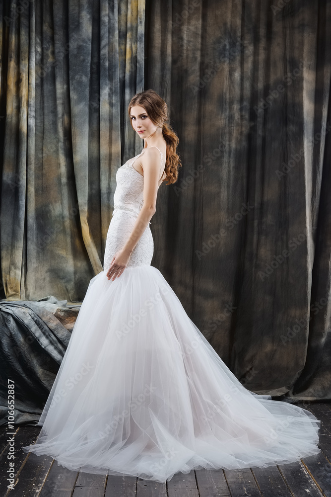 pretty bride in wedding dress posing pretty bride in wedding dress posing