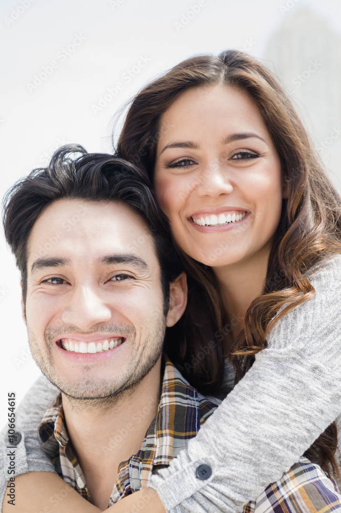 Smiling couple hugging Smiling couple hugging