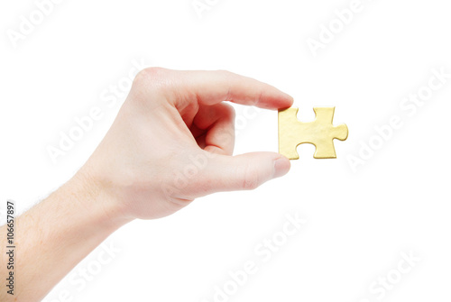 puzzle in hand isolated on white background