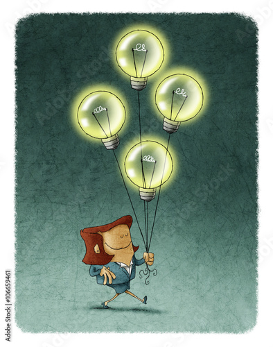 Businesswoman walking with four flying illuminated bulbs
